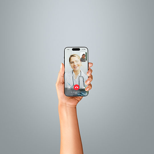 A hand holding a telemedicine mobile phone